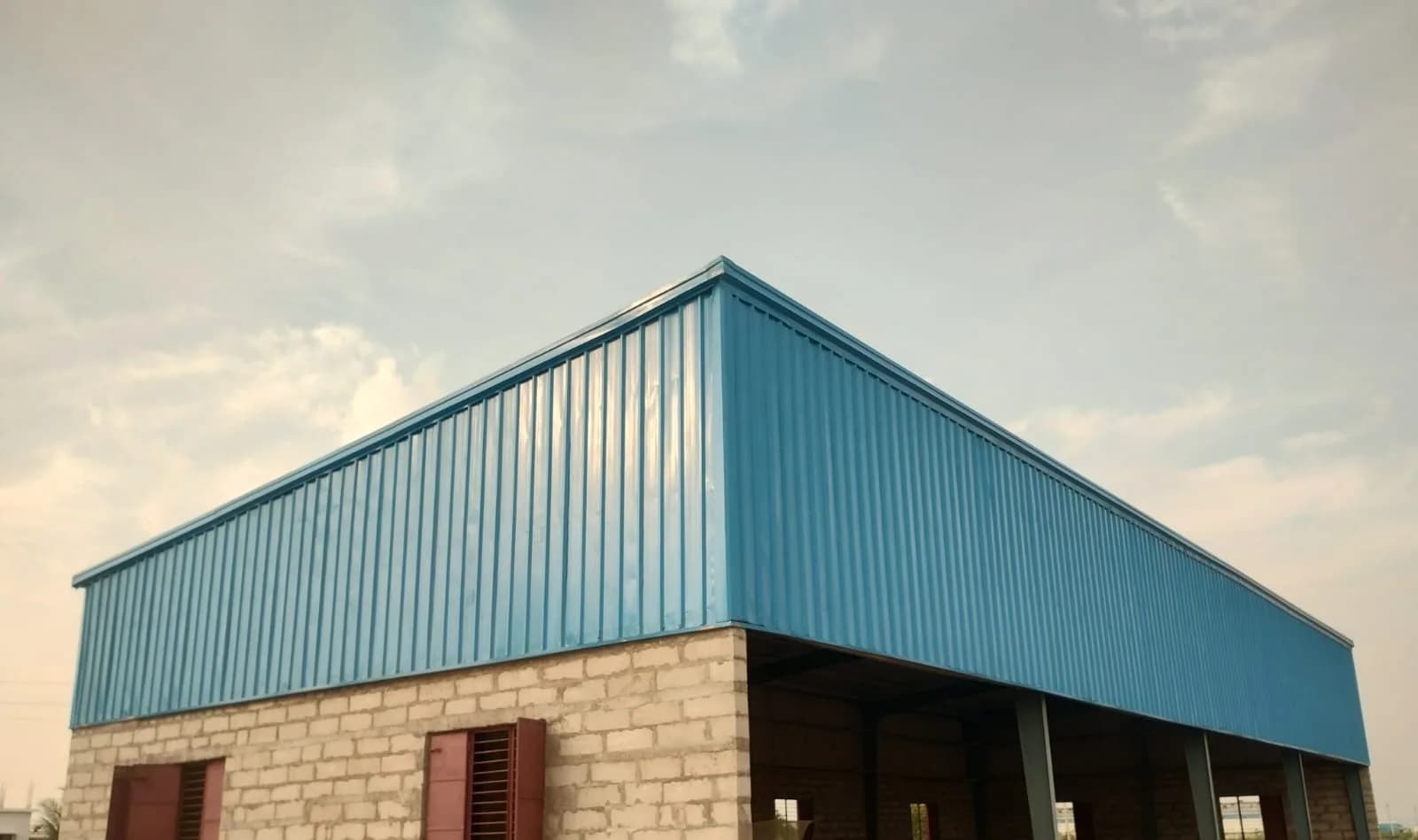 Blue-Clad Industrial Sheds, Kopparthi Industrial Area — steel building by KVK PEB Solutions in Kadapa, Andhra Pradesh